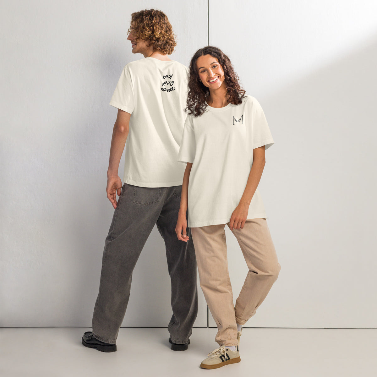 KUADRO 'Busy doing nada' oversized tee in vintage white — front and back on models